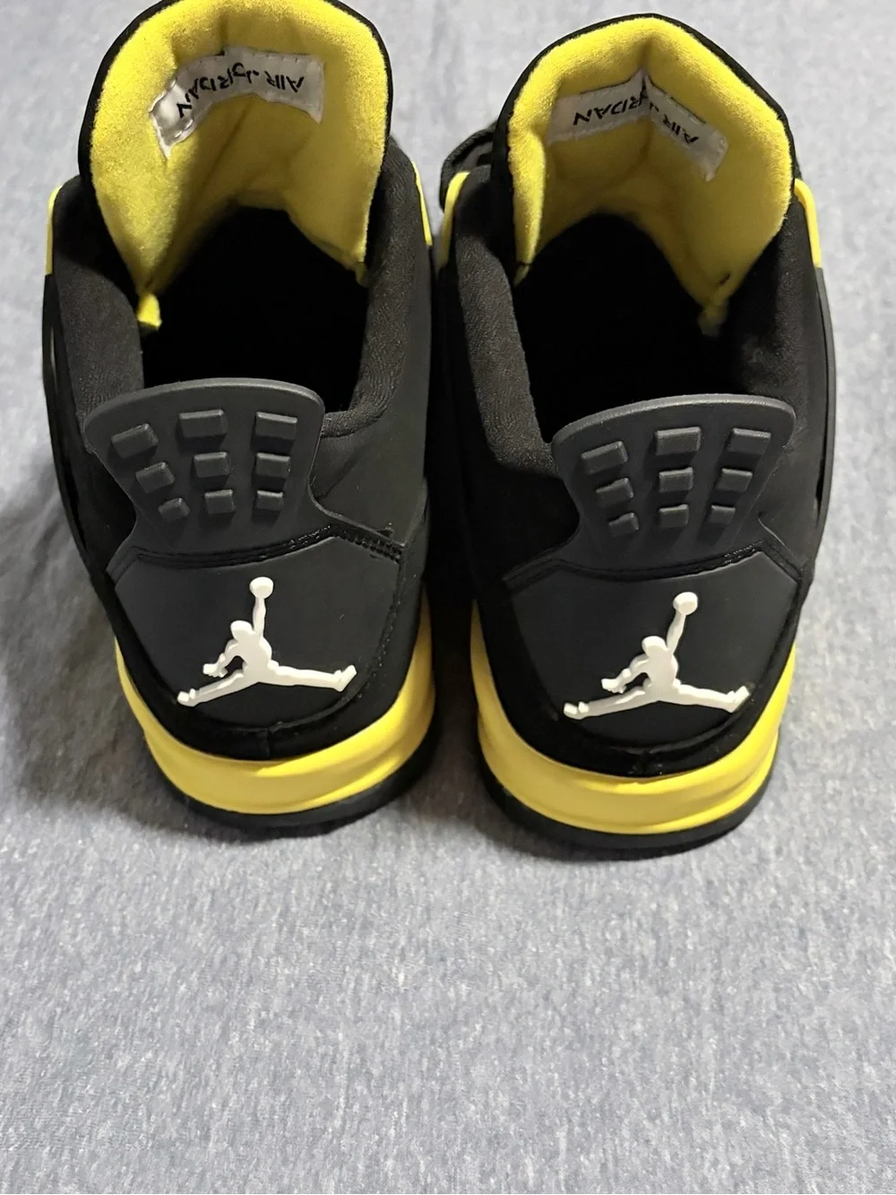 Jordan 4 Retro “Thunder” 2023 - Black/Yellow Retro Style
